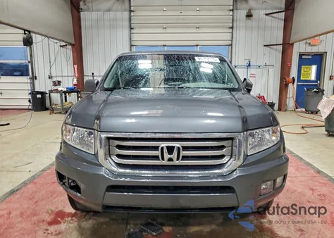 2012 Honda Ridgeline Rtl z USA, uszkodzony, nr VIN 5FPYK1F53CB003042